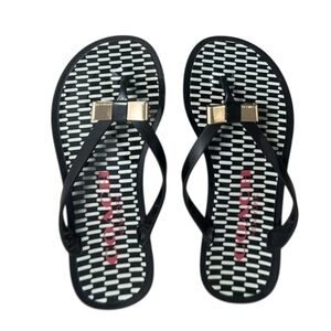 HP. COACH New York Landon Black Thong Jelly Flip Flops Sandals W Gold Bow Sz 6